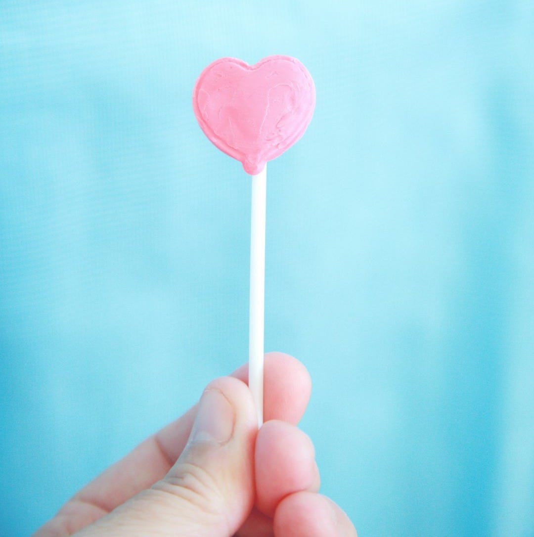 pink lollipop with white background pink lollipop with white background