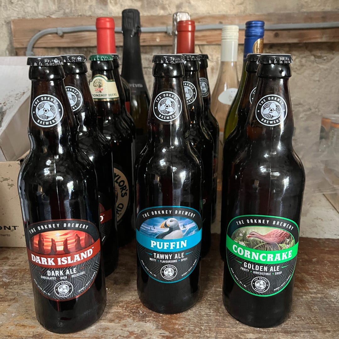 Image of beers & wine lined up in our outhouse