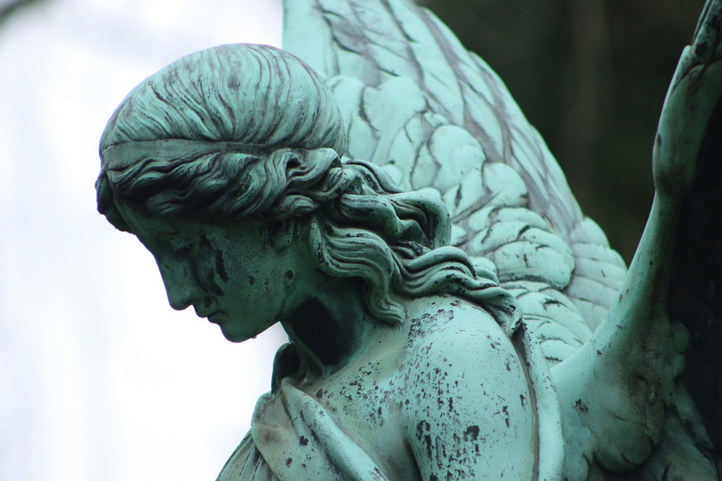 angel-statue-grayscale-photography angel-statue-grayscale-photography