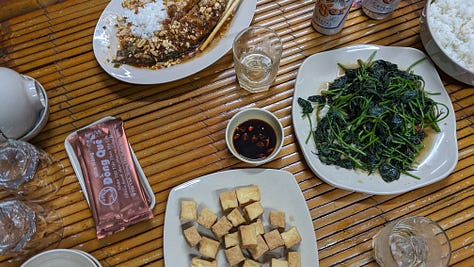 scenes of dining on the road to Thành phố Huế, Khe Sanh and back to Hue, Vietnam