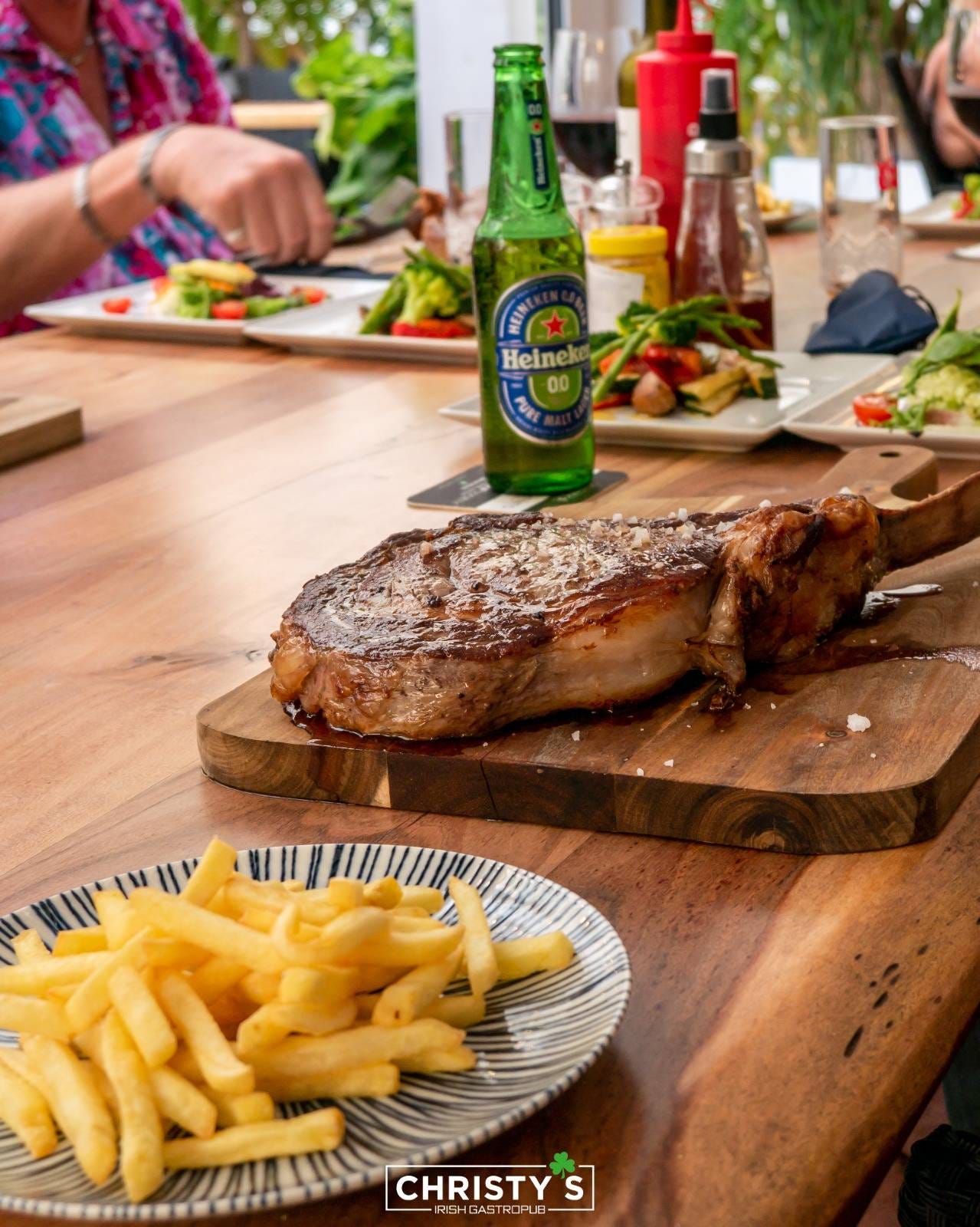 May be an image of 1 person, souvlakia and text