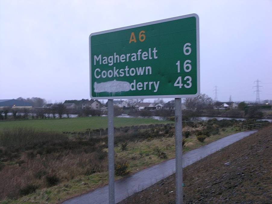 A road sign with 'Londonderry' vandalised to read 'derry' A road sign with 'Londonderry' vandalised to read 'derry'