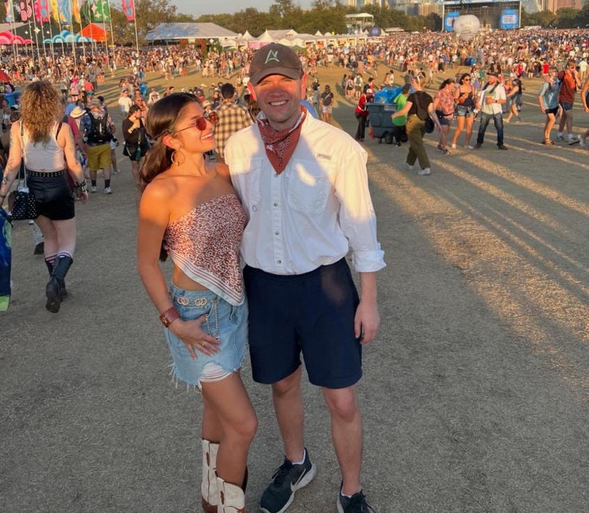James and Brianna posing for a photo at the ACL music festival.