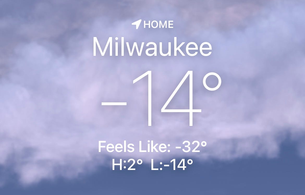 weather app screenshot showing -14 F temp and -32 F feels-like temp in Milwaukee weather app screenshot showing -14 F temp and -32 F feels-like temp in Milwaukee