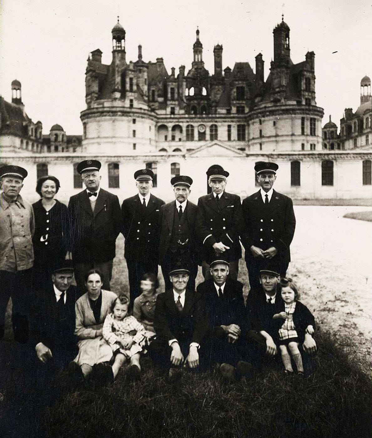 Louvre guards and their families outside Chambord castle