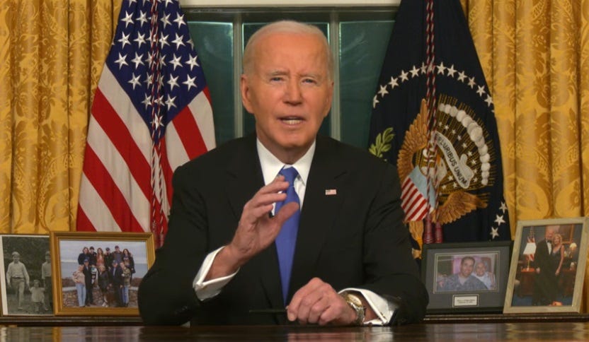 President Joe Biden gestures as he gives his farewell address in the Oval Office. Behind him are a US flag, a collection of family photos, and the curtained windows of the office. President Joe Biden gestures as he gives his farewell address in the Oval Office. Behind him are a US flag, a collection of family photos, and the curtained windows of the office.