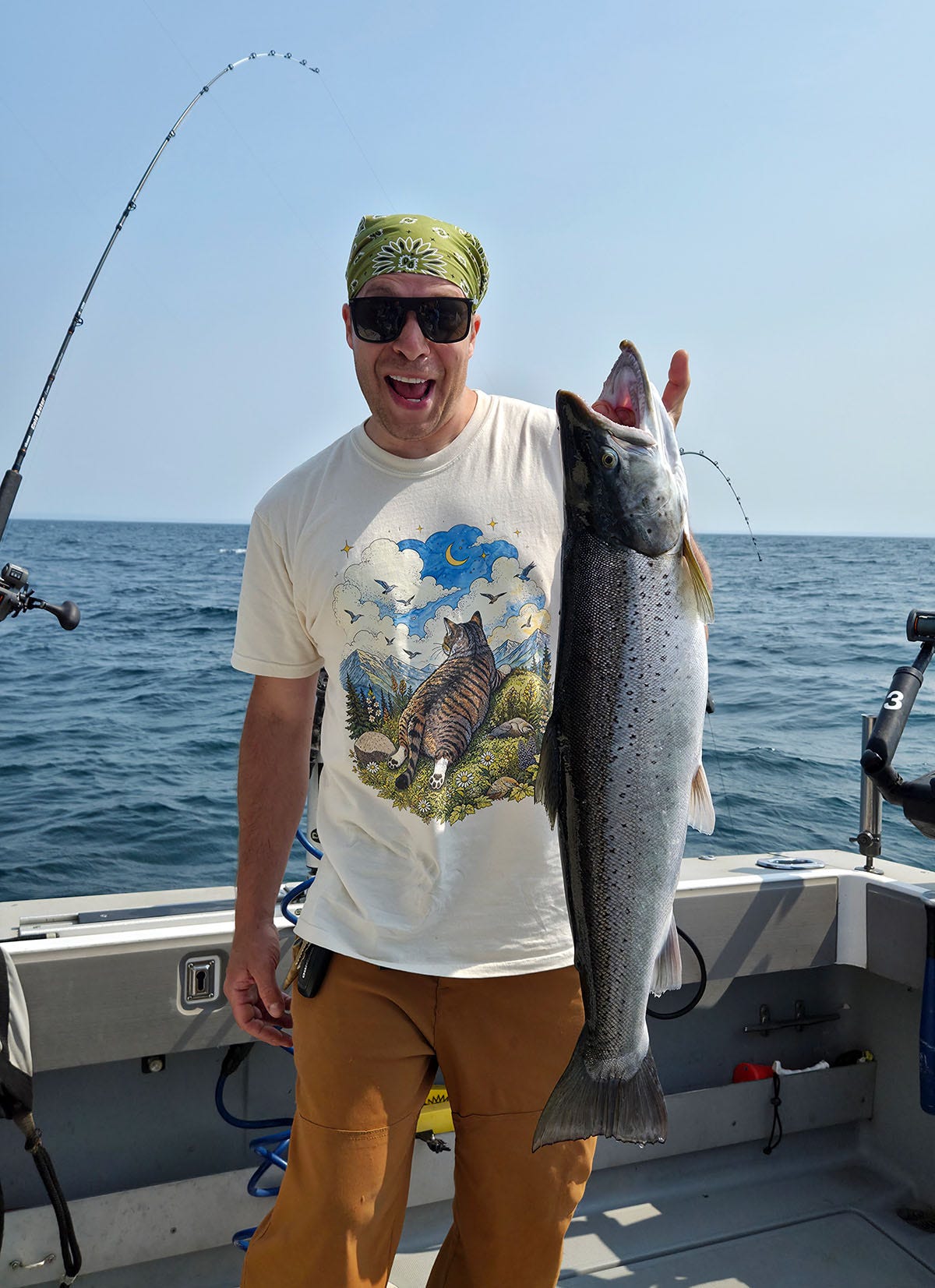 Alan Bergo with a huge brown trout. 