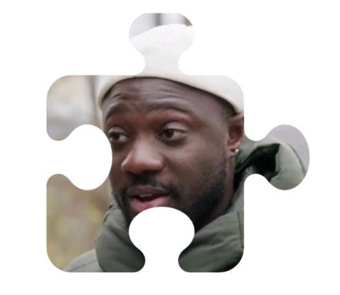 A person wearing a hat and looking at the camera

AI-generated content may be incorrect.