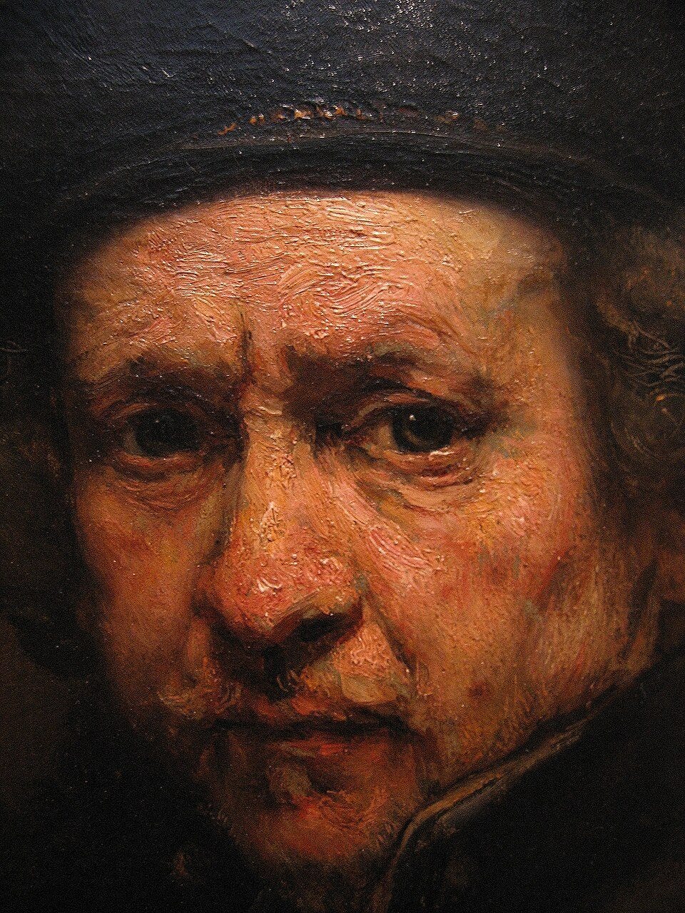 Close-up of an aging man's lined, heavy face with thick, textured brushwork. Close-up of an aging man's lined, heavy face with thick, textured brushwork.