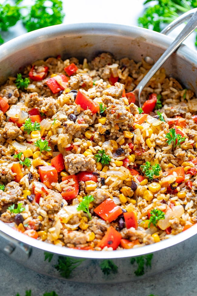 15-Minute Cowboy Beef and Rice Skillet - An EASY comfort food recipe with just 5 main ingredients made with everyday staples!! Juicy beef, tender rice, and just the right amount of kick from the salsa make this an automatic FAMILY FAVORITE!! 