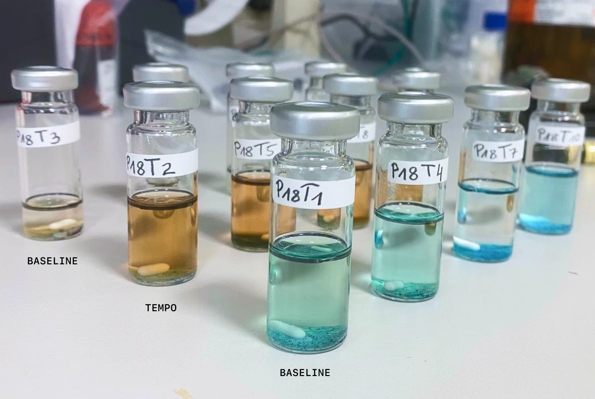 Labeled glass reaction vials from Molecule.one bench-scale validation experiments. Labeled glass reaction vials from Molecule.one bench-scale validation experiments.