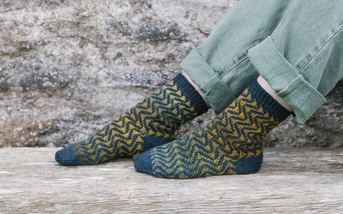 feet wearing colorwork socks