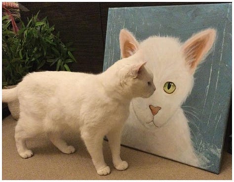 Students holding their paintings of their cats and dogs