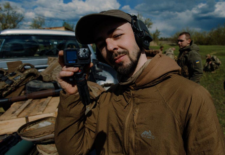 A cameraman from the 24th Brigade's Communications Unit holds a GoPro camera shattered while recording footage during a vehicle explosion in Donetsk Oblast, 2026. Photo by Ivan Petrychak A cameraman from the 24th Brigade's Communications Unit holds a GoPro camera shattered while recording footage during a vehicle explosion in Donetsk Oblast, 2026. Photo by Ivan Petrychak