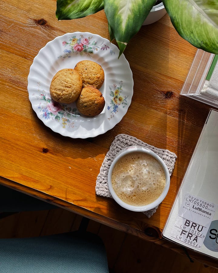 Gallery (2 images) - Image 1: Desk scene with three miso cookies on a plate, a cup of coffee, and my notebook. Image 2: Close-up of three miso cookies on a white floral plate.