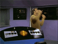 Captain Kirk from Star Trek getting frustrated and kicking the console.