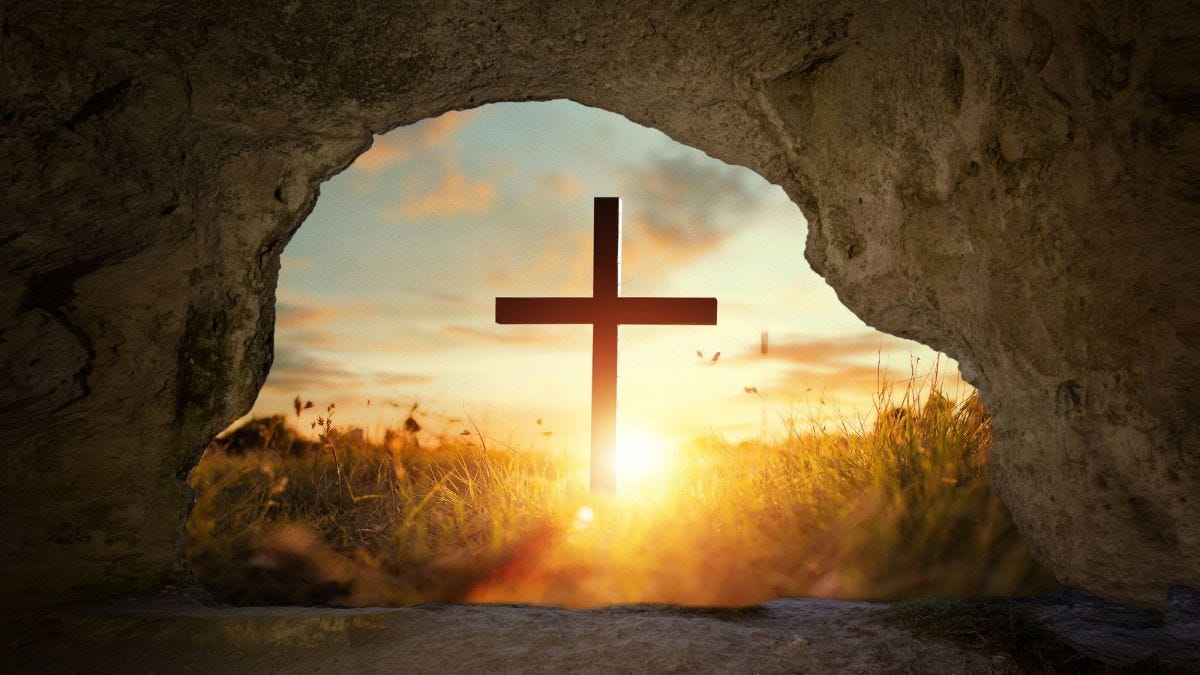 Christian cross with a sunrise in the background