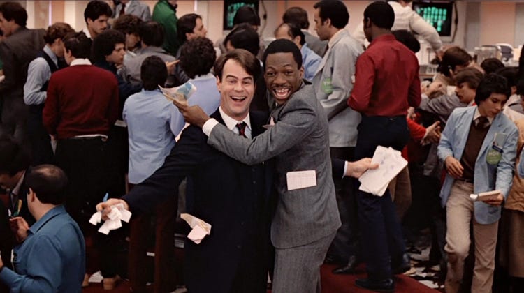Two men celebrating on a crowded trading floor, symbolizing financial wins and rapid momentum. Two men celebrating on a crowded trading floor, symbolizing financial wins and rapid momentum.