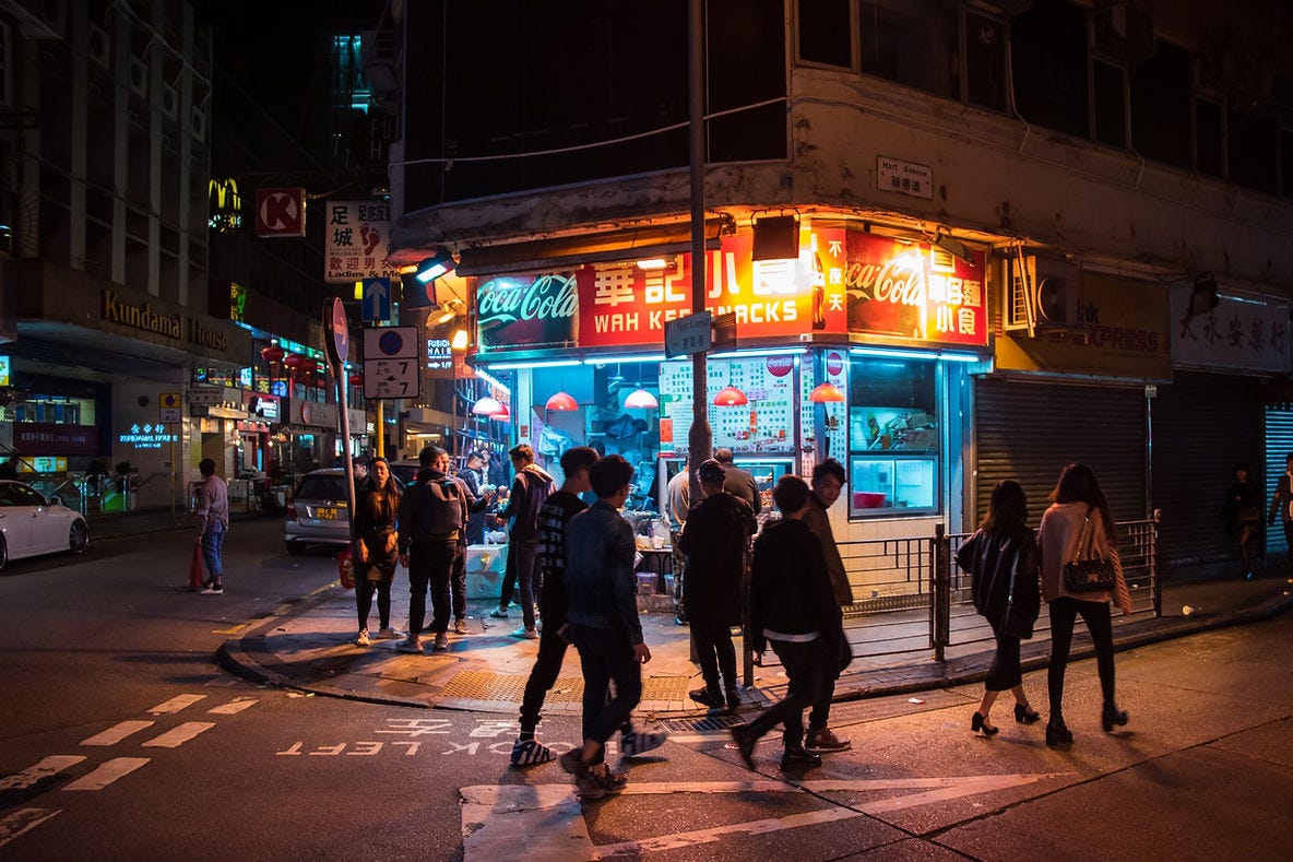 Hong Kongese walking at night.