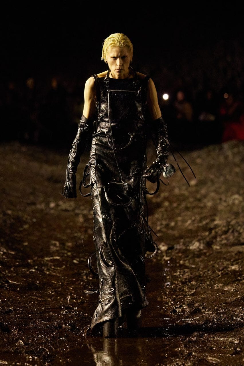 Santiago Sierra creates mud runway for Balenciaga