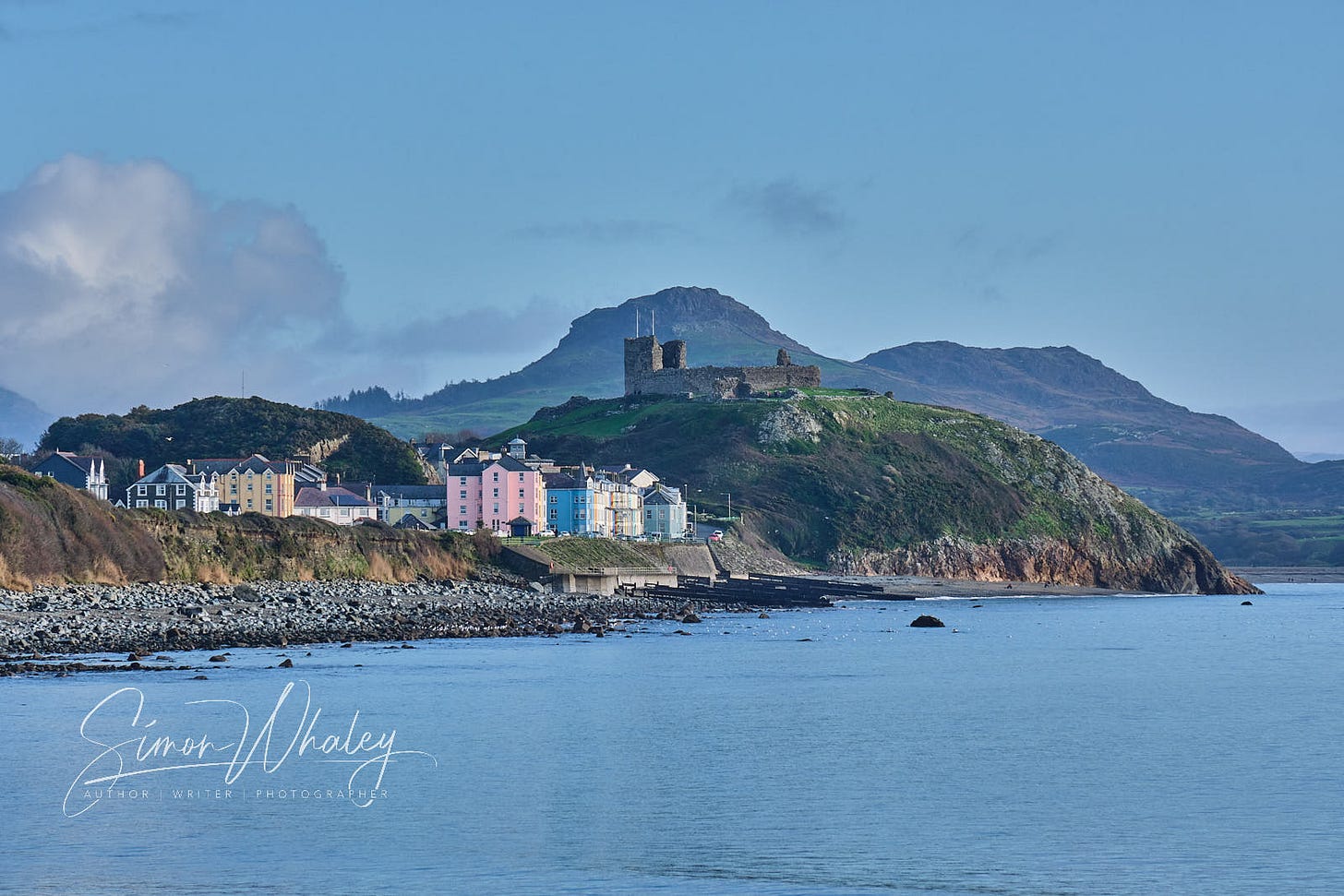 Criccieth Castle overlooking the Welsh seaside town of Criccieth, when the tide is in.