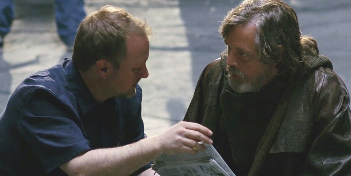 Director Rian Johnson speaks with Mark Hamill on the setof The Last Jedi.