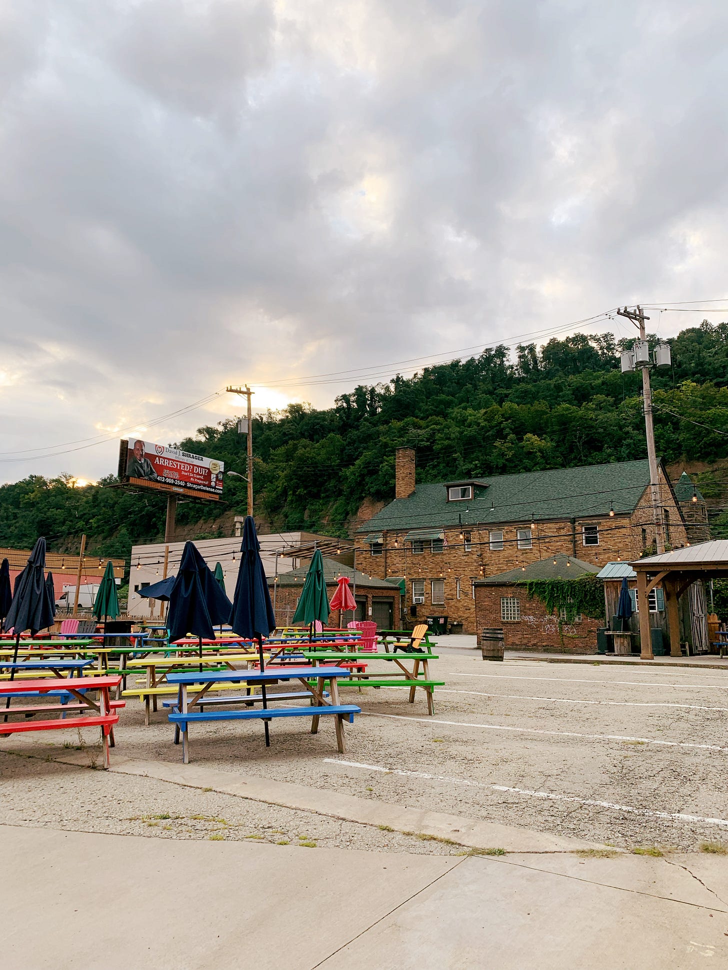 Restaurant with tables set up on a parking lot