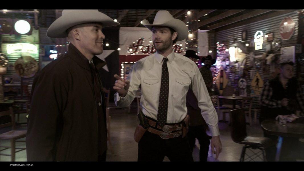 Cordell Walker laughing with Coby Bell James at Side Step bar. Cordell Walker laughing with Coby Bell James at Side Step bar.