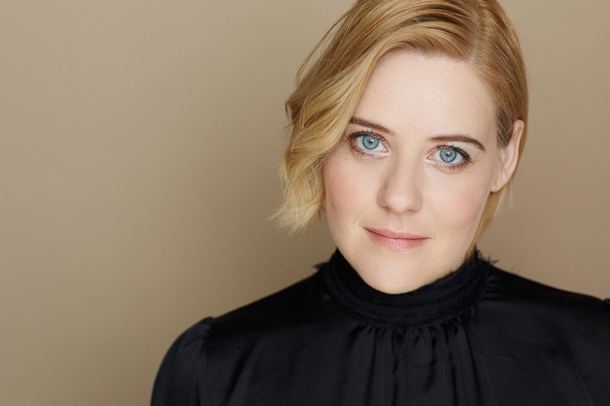 A woman looks at the camera A woman looks at the camera