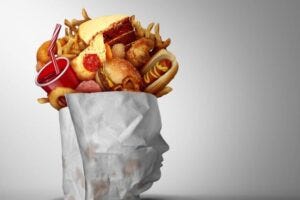 Ultra-Processed Food as an industry formulated snack made from processed ingredients with high fat sugar and salt with artificial flavour additives and preservatives and fake colouring.