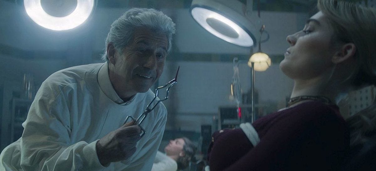 Crazy Doctor Jack with teeth pliers taunting a strapped down Meg Donelly Mar. Crazy Doctor Jack with teeth pliers taunting a strapped down Meg Donelly Mar.