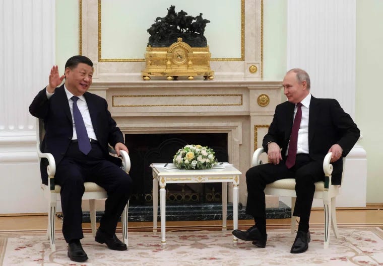 Chinese President Xi Jinping meets with Russian President Vladimir Putin at the Kremlin on Monday.Sergei Karphukhin / Sputnik via AFP - Getty Images Chinese President Xi Jinping meets with Russian President Vladimir Putin at the Kremlin on Monday.Sergei Karphukhin / Sputnik via AFP - Getty Images