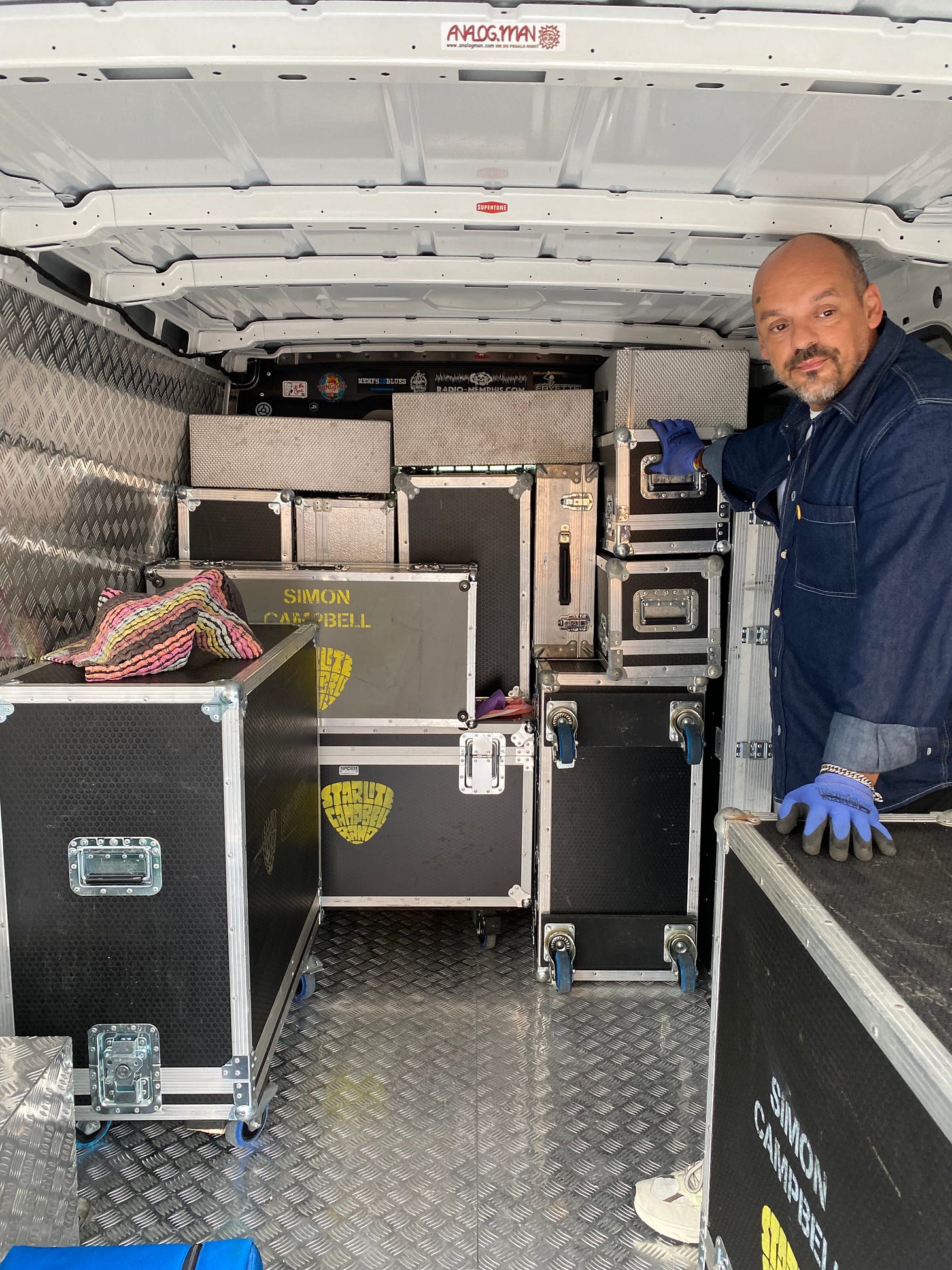 Hugo in the back of the Van of Rock - that’s just a quarter of our gear