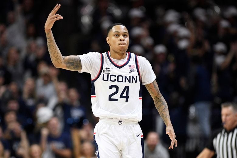 Hawkins leads unbeaten No. 8 UConn past Okla St 74-64 | The Seattle Times