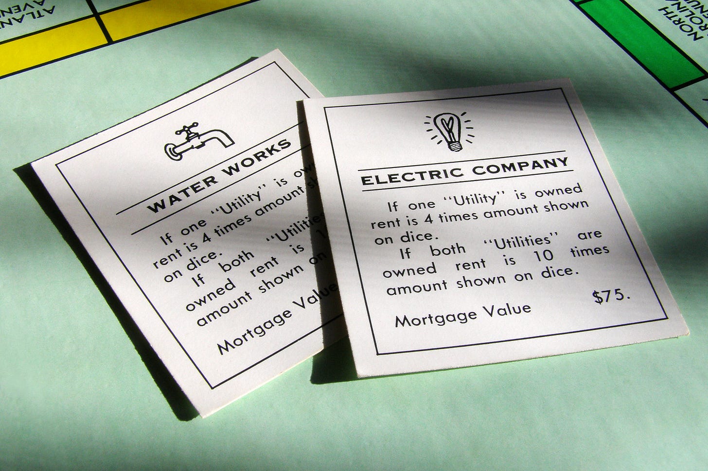 Utility cards from Monopoly board game Utility cards from Monopoly board game