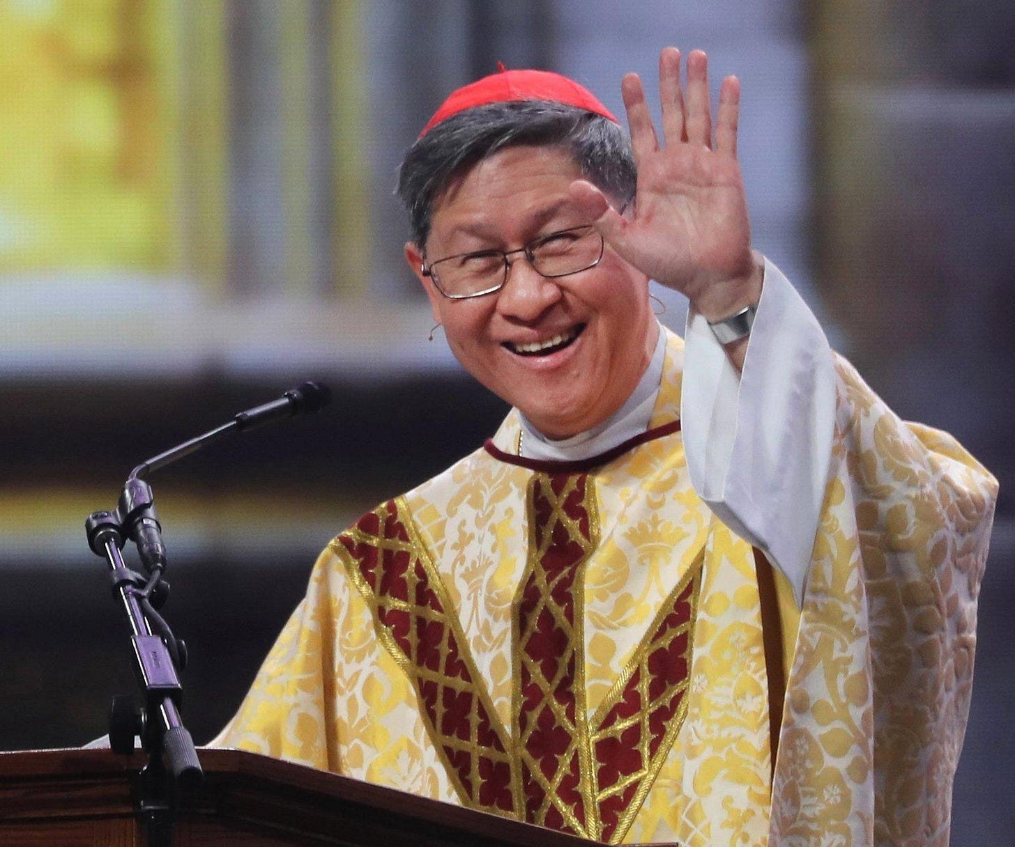 Cardinal Tagle waves while preaching at the National Eucharistic Congress Cardinal Tagle waves while preaching at the National Eucharistic Congress