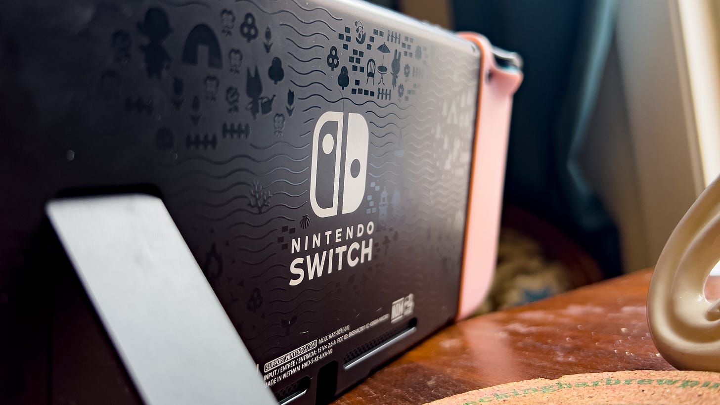 back of an Animal Crossing: New Horizons edition Switch on a table