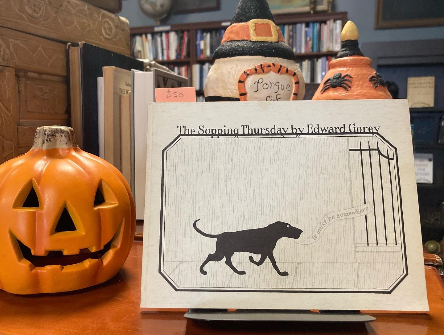 Cover of The Sopping Thursday set among Halloween decorations