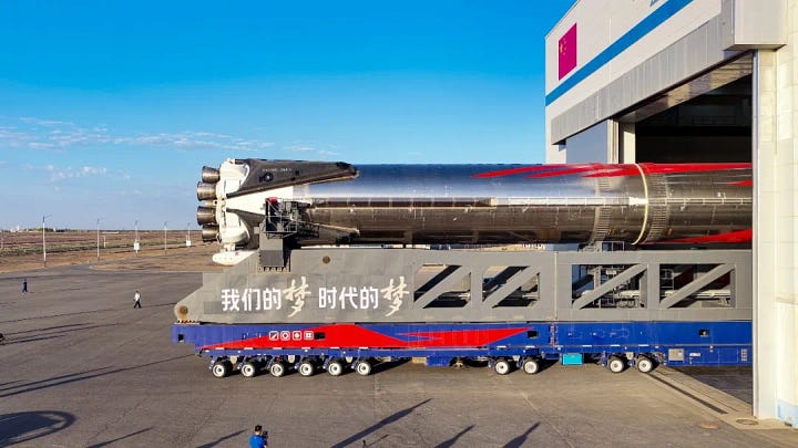 Zhuque-3 Y2's first and second stages rolling out atop of its transporter erector, and its payload fairing being placed atop of the launch vehicle.