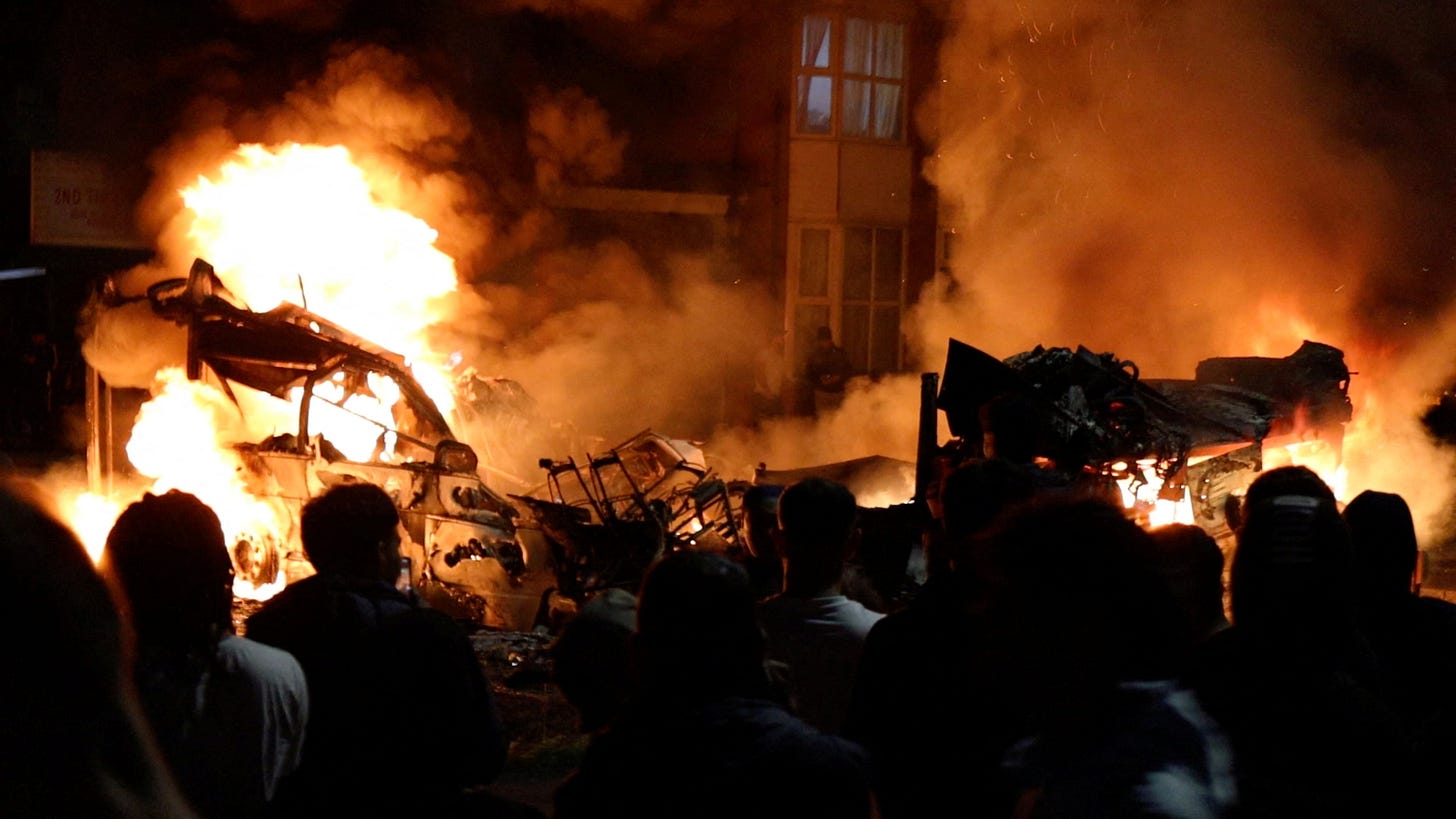 Riot in Leeds as police car overturned, bus torched and fires in Harehills  | The Independent