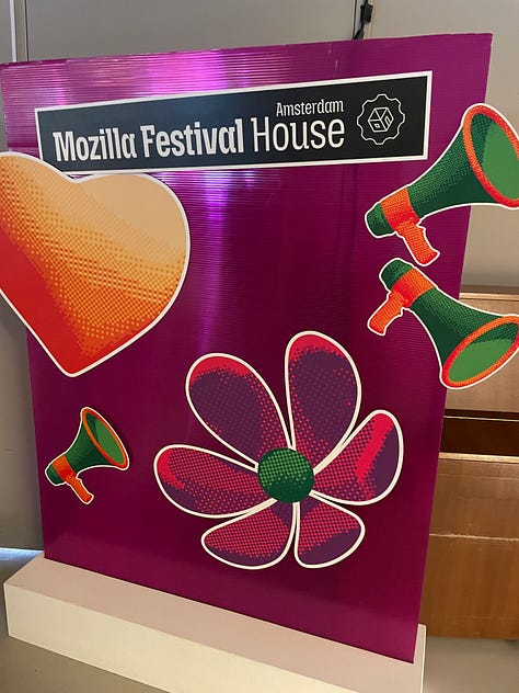 Impressions from MozFest 2024 in Amsterdam. Pictures from plenum discussions and an art installation.