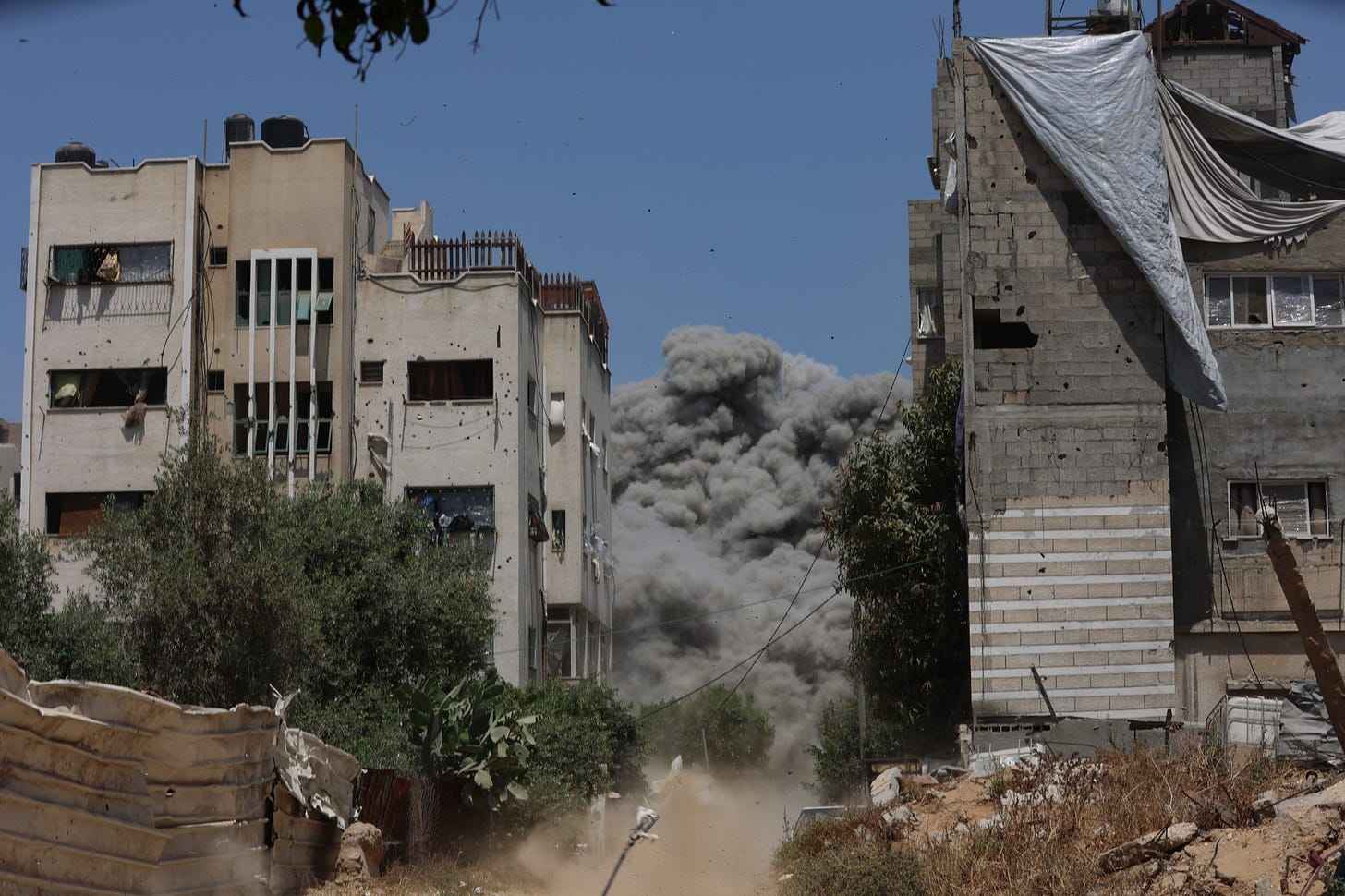 Smoke billows following Israeli strikes on the al-Qattaa family home in al-Tuffah neighborhood in Gaza City on May 31, 2025. (Omar Elqataa)