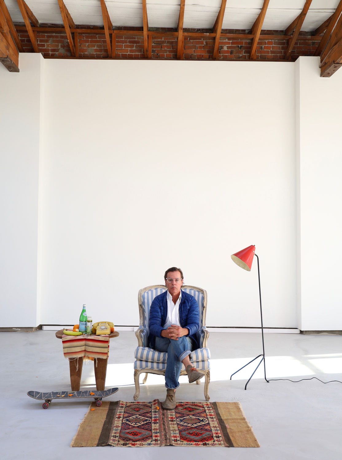 Image of Andy Spade sitting in the Partners and Spade office space.
