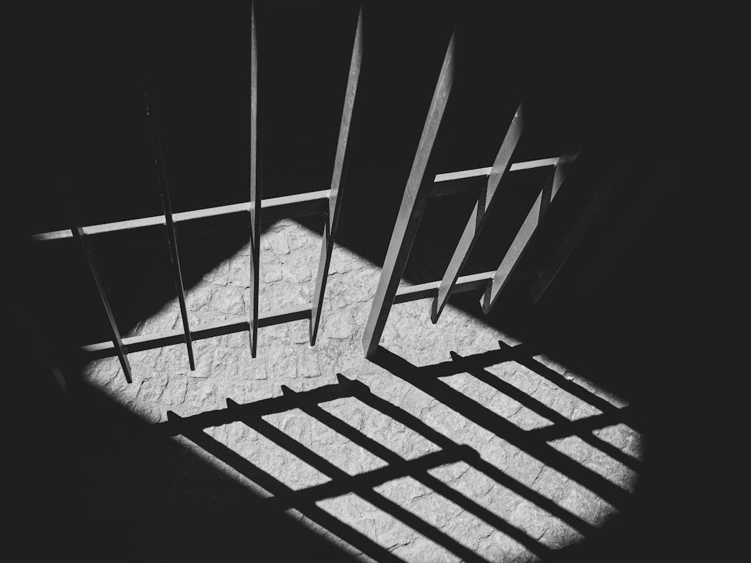 black metal frame in grayscale photography black metal frame in grayscale photography