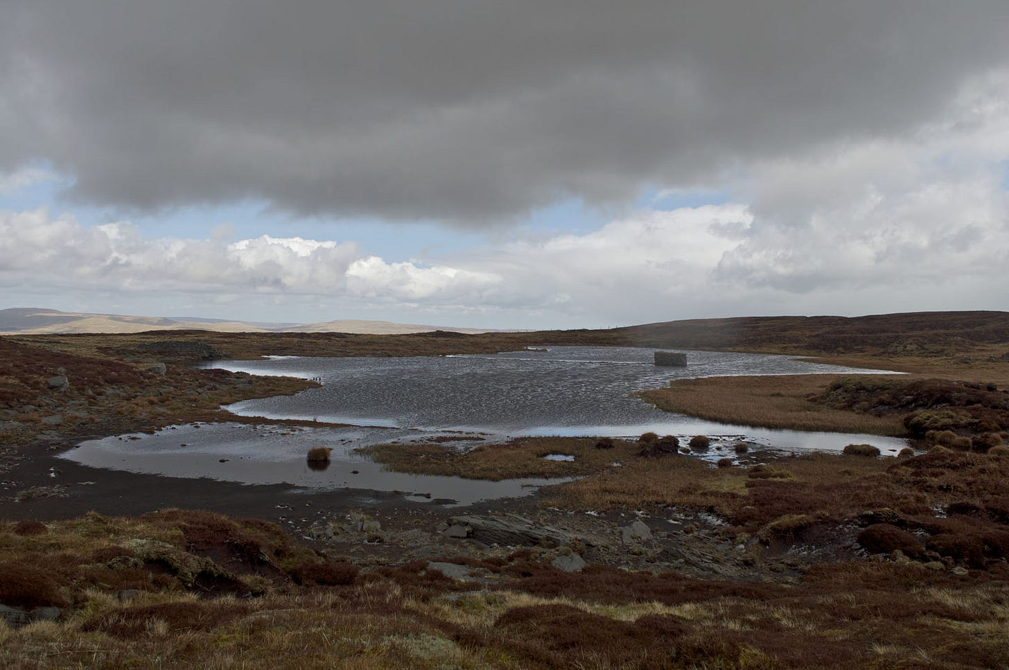gloomy pool, moorland top