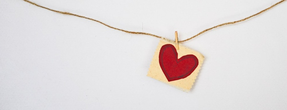 heart-shaped red and beige pendant