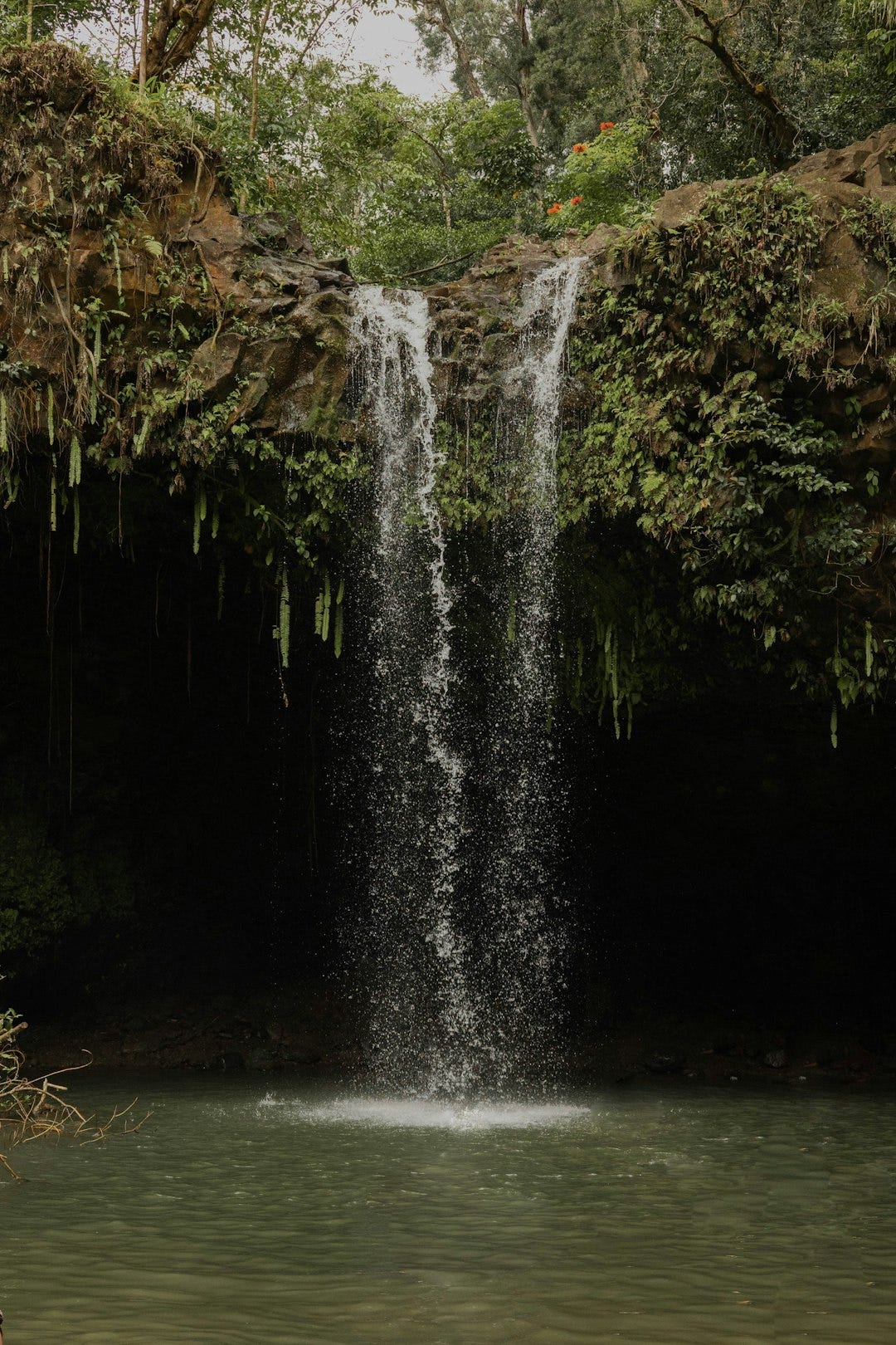 a large waterfall is coming out of the water a large waterfall is coming out of the water