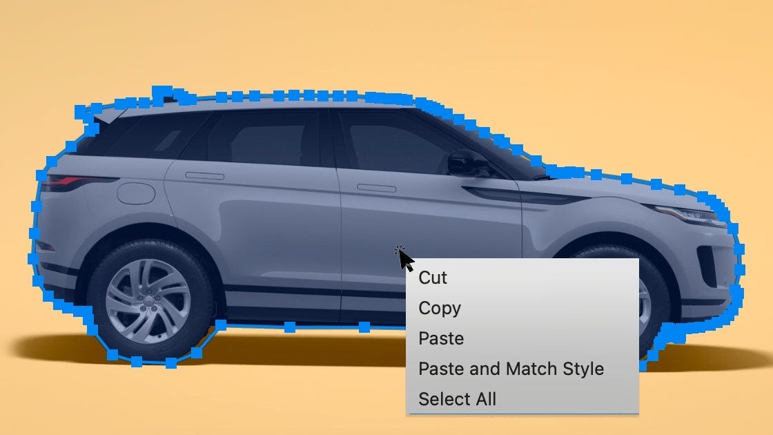 A side view of a gray SUV with a menu displaying options like Cut, Copy, Paste, and Select All, set against a bright orange background.