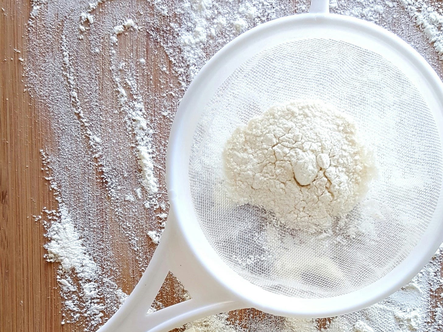 flour in sifter flour in sifter