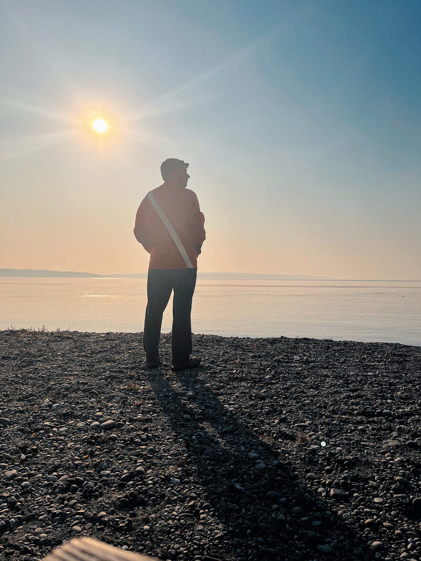 Smoky sun, with the puget sound infron of AJ, back tuned where you see the diver flag stripe on his jacket